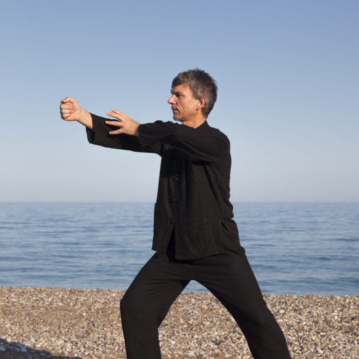 Man practicing Tai Chi – Posture Fist